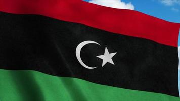 libysche Nationalflagge weht im Wind, blauer Himmelshintergrund. 3D-Rendering foto