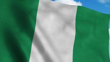 Nigeria Flagge auf einem Fahnenmast weht im Wind, blauer Himmelshintergrund. 3D-Rendering foto