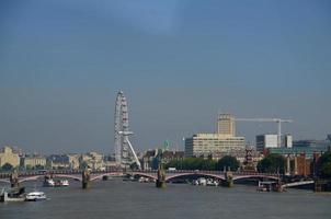 London Eye und Brücke foto