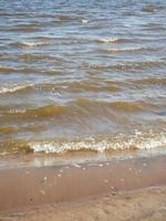 Wellen und Sand foto