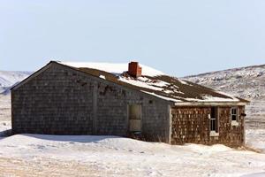 altes Gehöft im Winter Saskatchewan foto