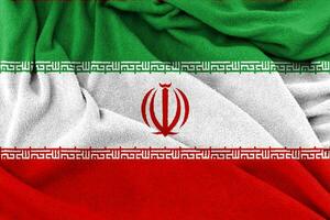 Stoffstruktur des Hintergrunds der iranischen Nationalflagge. foto