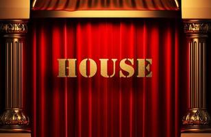 Haus goldenes Wort auf rotem Vorhang foto