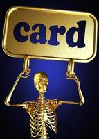 Kartenwort und goldenes Skelett foto