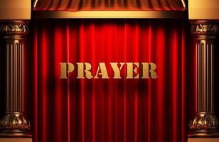 Gebet goldenes Wort auf rotem Vorhang foto