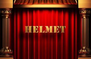Helm goldenes Wort auf rotem Vorhang foto