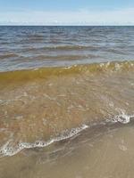 Wellen und Sand foto