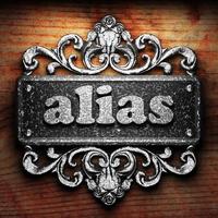 Alias-Wort aus Eisen auf Holzhintergrund foto