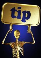 Tippwort und goldenes Skelett foto