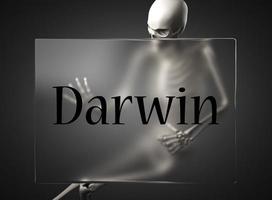 Darwin-Wort auf Glas und Skelett foto