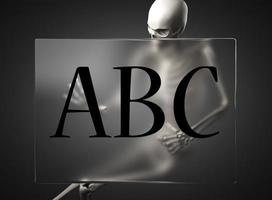 ABC-Wort auf Glas und Skelett foto