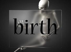 Geburtswort auf Glas und Skelett foto