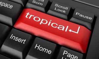 tropisches Wort auf roter Tastaturtaste foto