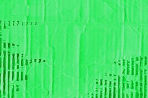 abstrakte hellgrüne Kartonoberfläche faltet Paketstruktur mit Grunge-Kartonblatt-Papiermuster. foto