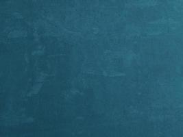 schöner abstrakter grunge dekorativer marineblauer türkiser dunkler Stuckwandhintergrund. Kunst raues stilisiertes Texturbanner mit Platz für Text foto