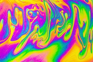Regenbogenfarben. psychedelischer mehrfarbiger musterhintergrund. Fotomakroaufnahme von Seifenblasen foto