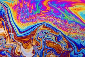 Regenbogenfarben. psychedelischer mehrfarbiger musterhintergrund. Fotomakroaufnahme von Seifenblasen foto