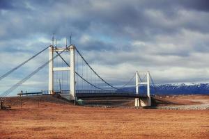 Brücke über einen Kanal, der die Jökulsárlón-Lagune verbindet foto