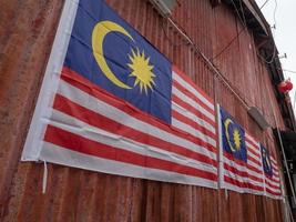 Malaysia-Flagge hängt an der Wand. foto