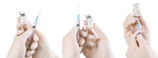Hand mit Spritze mit Impfstoff gegen Corona-Virus. foto