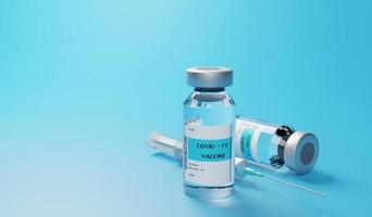 covid 19 impfstoff auf blauem hintergrund foto