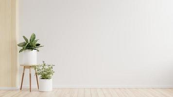 Leerer Raum der weißen Wand mit Pflanzen auf einem Boden. foto