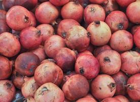 Granatapfel-Obst-Lebensmittel-Hintergrund foto