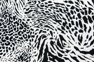 textur des druckstoffs gestreiftes zebra und leopard für den hintergrund foto