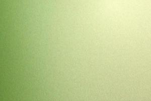 Textur der Reflexion auf rauer hellgrüner Stahlwand, abstrakter Hintergrund foto