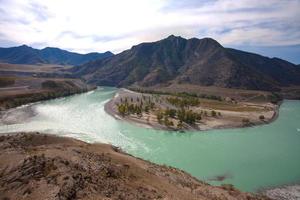 Zusammenfluss der türkisfarbenen Flüsse foto