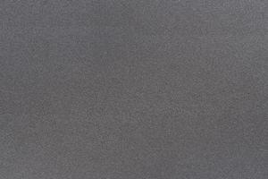 textur aus metall dunkelschwarzer farbe hat raue oberfläche, abstrakter hintergrund foto