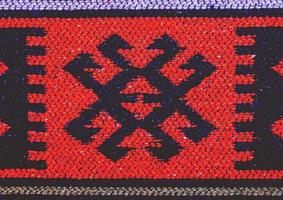 rumänische volkstümliche nahtlose musterverzierungen. rumänische traditionelle Stickerei. ethnisches texturdesign. traditionelles Teppichdesign. Teppichverzierungen. rustikales Teppichdesign. foto