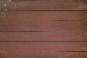 Vintage braune Holzhintergrundtextur mit Knoten und Nagellöchern. alte bemalte Holzwand. brauner abstrakter hintergrund. vintage hölzerne dunkle horizontale bretter. Vorderansicht mit Kopierbereich