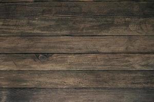 Vintage braune Holzhintergrundtextur mit Knoten und Nagellöchern. alte bemalte Holzwand. brauner abstrakter hintergrund. vintage hölzerne dunkle horizontale bretter. Vorderansicht mit Kopierbereich