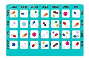 wöchentliche medikamente in einer pillendose für den täglichen gebrauch auf französisch foto