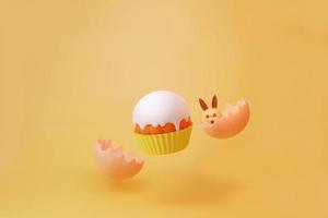 Fliegender Cupcake und Babykaninchen aus dem Ei gebrochen für Ostereitag und Feier 3D-Darstellung foto