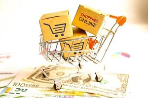 online-shopping, einkaufswagenbox mit geld, import export, finanzhandel. foto