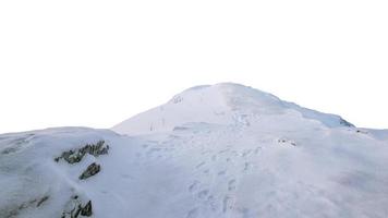 schneebedeckte Hügellandschaft mit Fußabdruck im Hintergrund foto