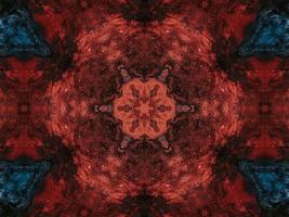 buntes Blumenreflexions-Kaleidoskopmuster. abstrakter Hintergrund. kostenloses Foto. foto