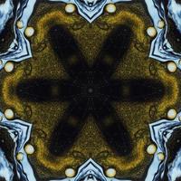 abstrakter hintergrund des dunklen kreises. Kaleidoskopmuster in gelber und blauer Farbe. kostenloses Foto