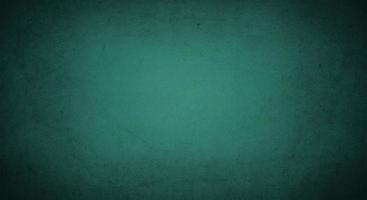 dunkelgrüner Grunge-Hintergrund mit weicher heller und dunkler Grenze, alter Vintage-Hintergrund foto