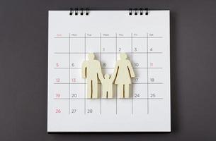 weiße Symbolfamilie im Kalender, Familienkonzept foto