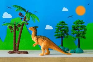 Parasaurolophus-Dinosaurier-Spielzeugmodell auf wildem Modellhintergrund foto