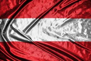 österreich tuch flagge satin flaggen wehende stoff textur der flagge foto