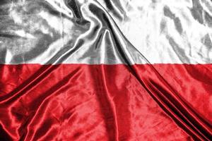 polnische Stoffflagge Satinfahne winkende Stoffstruktur der Flagge foto