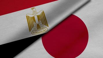 3D-Darstellung von zwei Flaggen aus der arabischen Republik Ägypten und Japan zusammen mit Stoffstruktur, bilateralen Beziehungen, Frieden und Konflikten zwischen Ländern, ideal für den Hintergrund foto