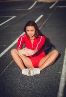 schöne Frau in Sportbekleidung foto