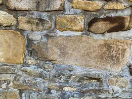 Hintergrund der alten Steinmauer. steinerne Kulisse foto