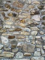 Hintergrund der alten Steinmauer. steinerne Kulisse foto