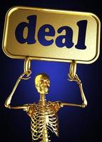 Deal-Wort und goldenes Skelett foto